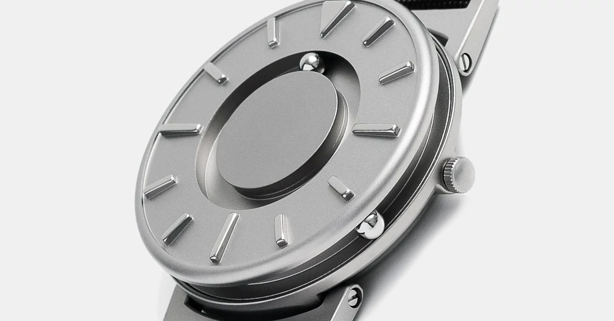 Pormenor do mecanismo tátil de esferas no mostrador circular