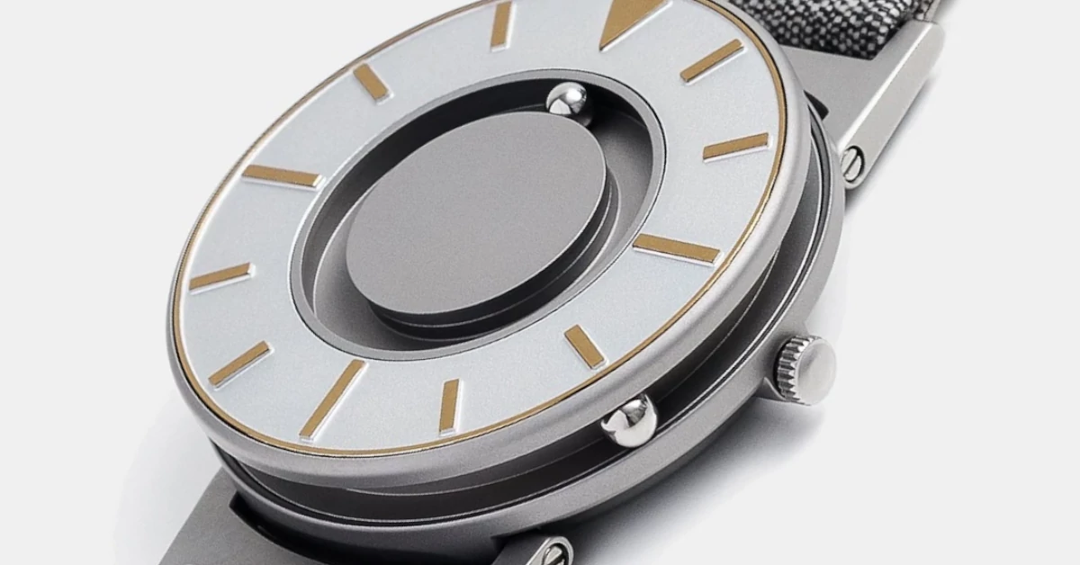 Pormenor do mecanismo tátil de esferas no mostrador circular