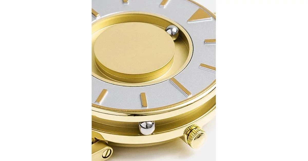 Pormenor o mecanismo tátil de esferas no mostrador circular