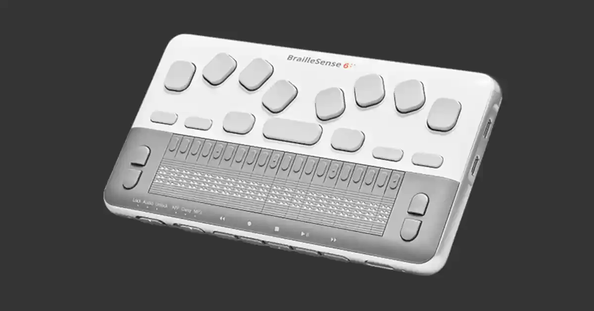 Bloco de notas branco e cinza claro com linha Braille de 20 células e teclado estilo Perkins.